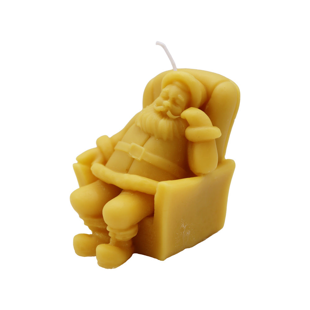 Bienenwachskerze „Weihnachtsmann im Sessel“