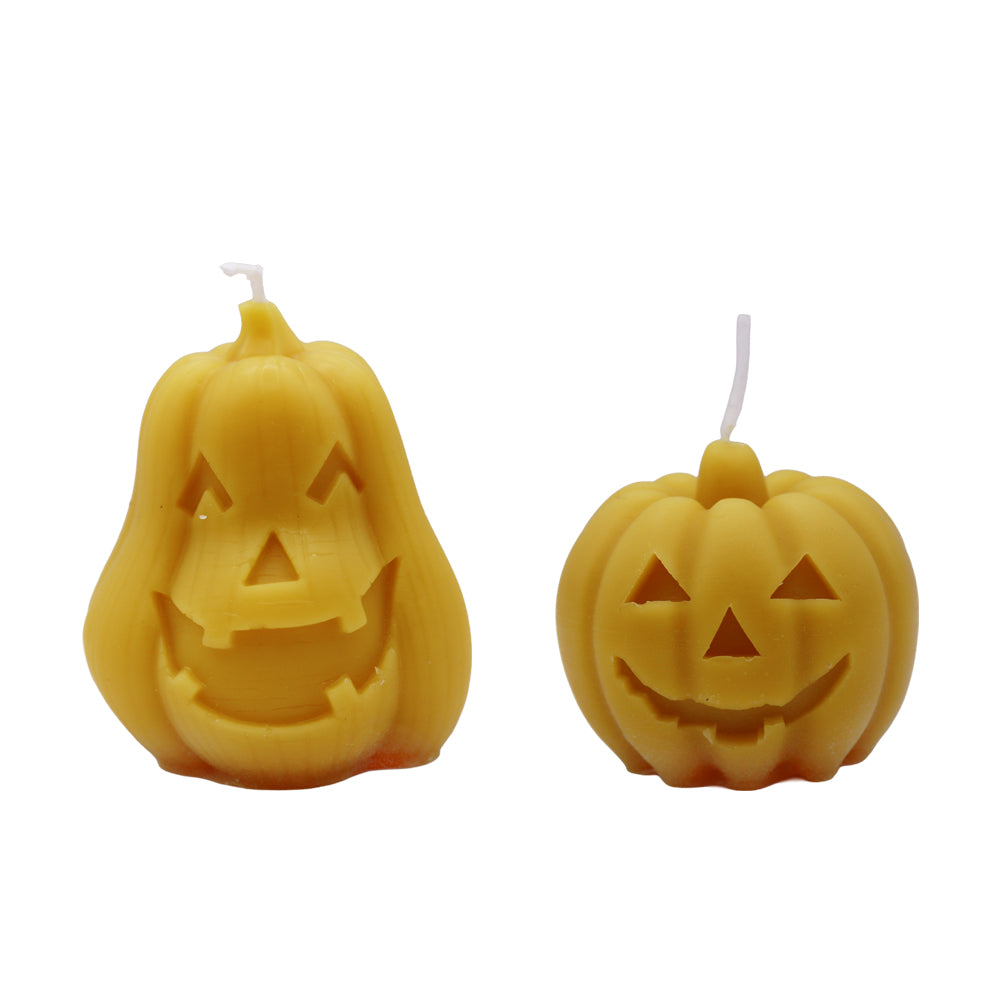 Handgegossene Bienenwachskerze Halloween-Kürbis rund mit lachendem Gesicht