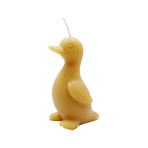 Handgefertigte Bienenwachskerze in Form einer kleinen Ente