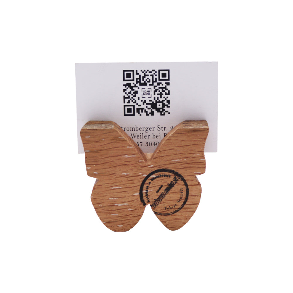 Kleiner bunter Schmetterling als Fotohalter aus Holz alter Weinfässer