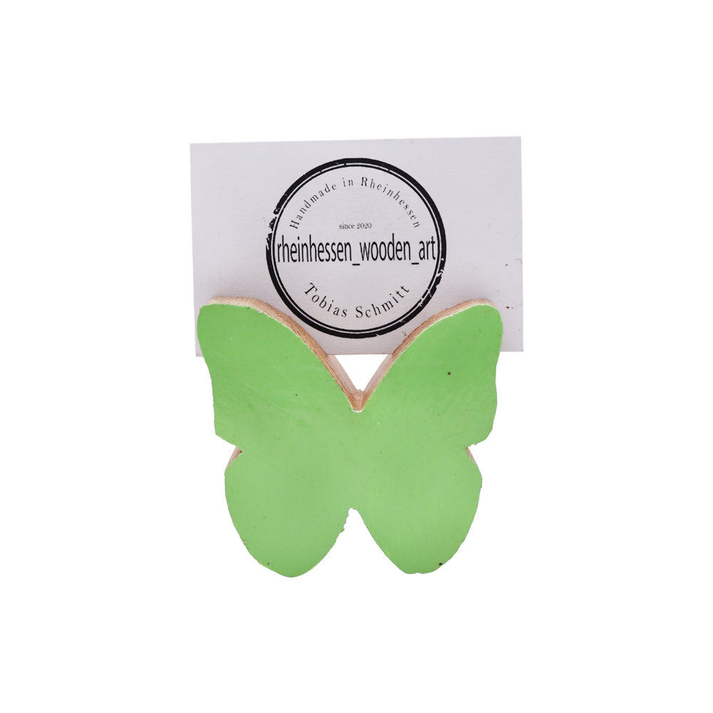 Kleiner bunter Schmetterling als Fotohalter aus Holz alter Weinfässer